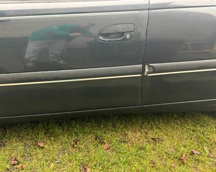 Черный Опель Омега, объемом двигателя 2.5 л и пробегом 274 тыс. км за 2000 $, фото 5 на Automoto.ua