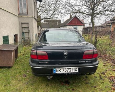 Черный Опель Омега, объемом двигателя 2.5 л и пробегом 274 тыс. км за 2000 $, фото 2 на Automoto.ua