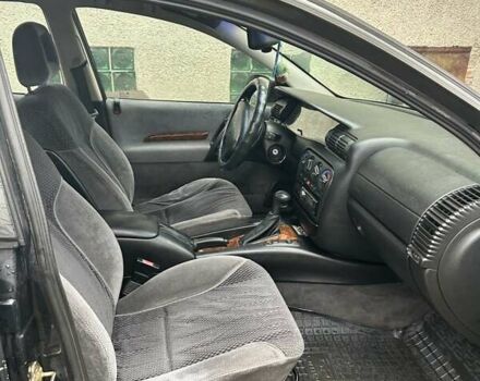 Черный Опель Омега, объемом двигателя 2.5 л и пробегом 274 тыс. км за 2000 $, фото 10 на Automoto.ua