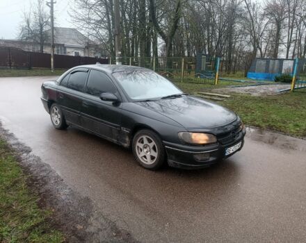 Черный Опель Омега, объемом двигателя 2 л и пробегом 300 тыс. км за 1500 $, фото 1 на Automoto.ua