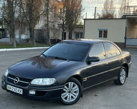 Черный Опель Омега, объемом двигателя 2 л и пробегом 393 тыс. км за 2800 $, фото 1 на Automoto.ua