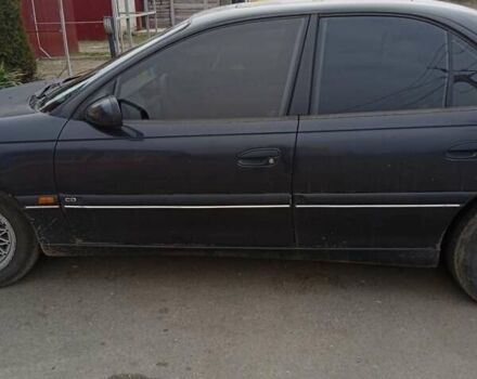 Черный Опель Омега, объемом двигателя 2.5 л и пробегом 328 тыс. км за 3000 $, фото 5 на Automoto.ua