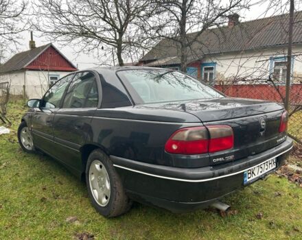 Черный Опель Омега, объемом двигателя 2.5 л и пробегом 274 тыс. км за 2000 $, фото 1 на Automoto.ua