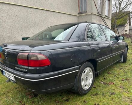 Черный Опель Омега, объемом двигателя 2.5 л и пробегом 274 тыс. км за 2000 $, фото 3 на Automoto.ua