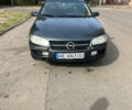 Чорний Опель Омега, об'ємом двигуна 2 л та пробігом 300 тис. км за 2000 $, фото 1 на Automoto.ua