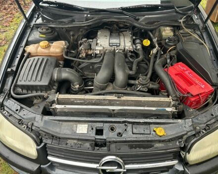 Черный Опель Омега, объемом двигателя 2.5 л и пробегом 274 тыс. км за 2000 $, фото 13 на Automoto.ua