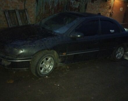 Черный Опель Омега, объемом двигателя 2 л и пробегом 300 тыс. км за 750 $, фото 1 на Automoto.ua