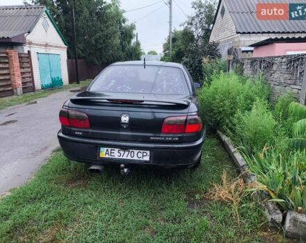 Черный Опель Омега, объемом двигателя 2.5 л и пробегом 500 тыс. км за 800 $, фото 1 на Automoto.ua