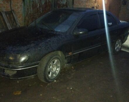 Черный Опель Омега, объемом двигателя 2 л и пробегом 300 тыс. км за 750 $, фото 2 на Automoto.ua