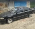Чорний Опель Омега, об'ємом двигуна 2 л та пробігом 77 тис. км за 502 $, фото 2 на Automoto.ua