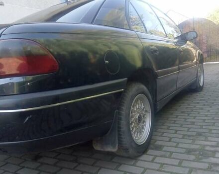 Черный Опель Омега, объемом двигателя 2.5 л и пробегом 357 тыс. км за 2650 $, фото 1 на Automoto.ua