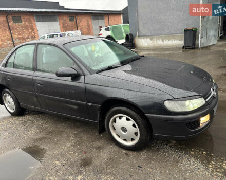 Черный Опель Омега, объемом двигателя 2 л и пробегом 380 тыс. км за 3800 $, фото 7 на Automoto.ua