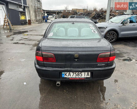 Черный Опель Омега, объемом двигателя 2 л и пробегом 380 тыс. км за 3800 $, фото 4 на Automoto.ua