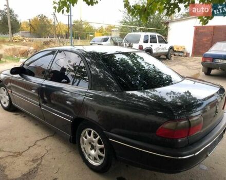 Черный Опель Омега, объемом двигателя 2.5 л и пробегом 155 тыс. км за 3000 $, фото 7 на Automoto.ua