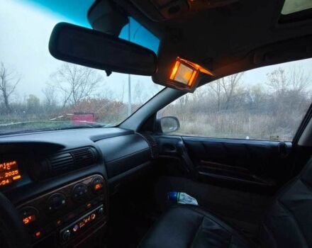 Черный Опель Омега, объемом двигателя 2 л и пробегом 335 тыс. км за 2400 $, фото 16 на Automoto.ua