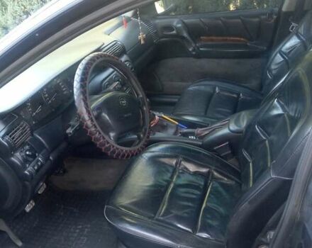 Черный Опель Омега, объемом двигателя 2.5 л и пробегом 357 тыс. км за 2650 $, фото 4 на Automoto.ua