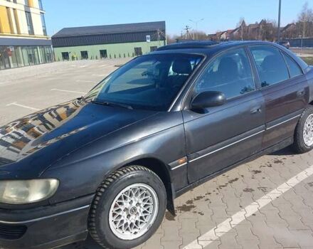 Чорний Опель Омега, об'ємом двигуна 2 л та пробігом 300 тис. км за 2000 $, фото 2 на Automoto.ua