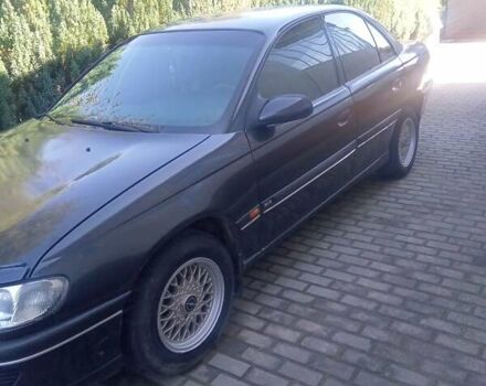 Черный Опель Омега, объемом двигателя 2.5 л и пробегом 357 тыс. км за 2650 $, фото 8 на Automoto.ua