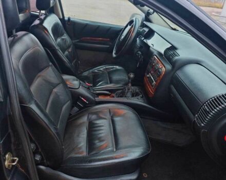 Черный Опель Омега, объемом двигателя 2 л и пробегом 335 тыс. км за 2400 $, фото 12 на Automoto.ua