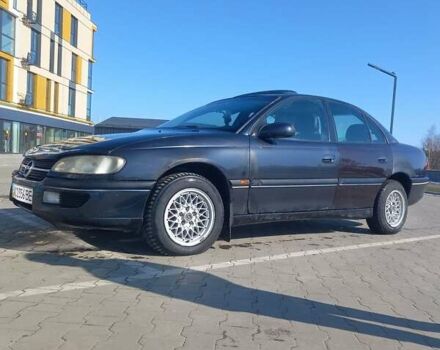 Чорний Опель Омега, об'ємом двигуна 2 л та пробігом 300 тис. км за 2000 $, фото 1 на Automoto.ua