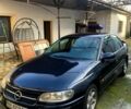 Черный Опель Омега, объемом двигателя 2.5 л и пробегом 320 тыс. км за 2550 $, фото 1 на Automoto.ua