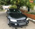 Черный Опель Омега, объемом двигателя 2.5 л и пробегом 155 тыс. км за 3000 $, фото 1 на Automoto.ua