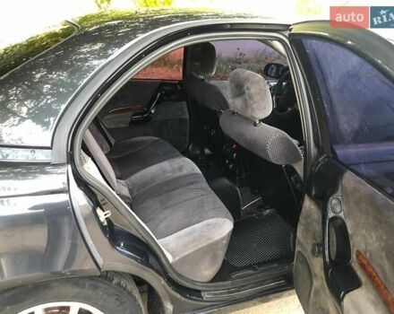 Черный Опель Омега, объемом двигателя 2.5 л и пробегом 155 тыс. км за 3000 $, фото 1 на Automoto.ua