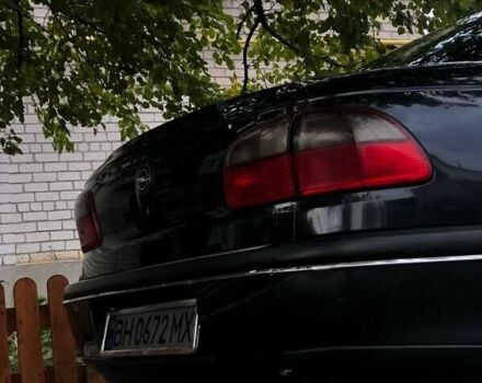 Черный Опель Омега, объемом двигателя 2.5 л и пробегом 155 тыс. км за 3000 $, фото 4 на Automoto.ua