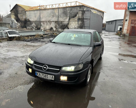 Черный Опель Омега, объемом двигателя 2 л и пробегом 380 тыс. км за 3800 $, фото 1 на Automoto.ua