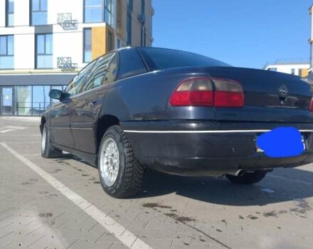 Чорний Опель Омега, об'ємом двигуна 2 л та пробігом 300 тис. км за 2000 $, фото 3 на Automoto.ua