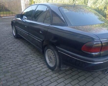 Черный Опель Омега, объемом двигателя 2.5 л и пробегом 357 тыс. км за 2650 $, фото 6 на Automoto.ua