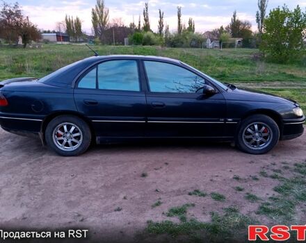 Черный Опель Омега, объемом двигателя 2 л и пробегом 394 тыс. км за 1600 $, фото 1 на Automoto.ua