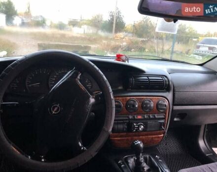 Черный Опель Омега, объемом двигателя 2.5 л и пробегом 155 тыс. км за 3000 $, фото 2 на Automoto.ua