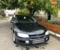 Черный Опель Омега, объемом двигателя 2.5 л и пробегом 155 тыс. км за 3000 $, фото 1 на Automoto.ua