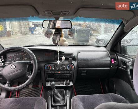 Черный Опель Омега, объемом двигателя 2 л и пробегом 380 тыс. км за 3800 $, фото 13 на Automoto.ua