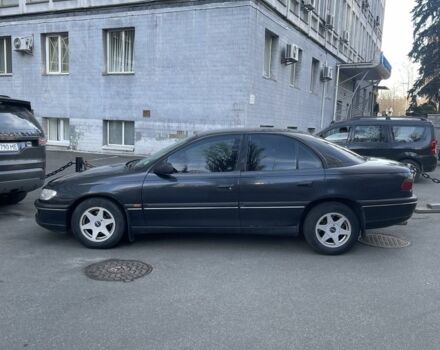 Чорний Опель Омега, об'ємом двигуна 2 л та пробігом 302 тис. км за 3000 $, фото 1 на Automoto.ua