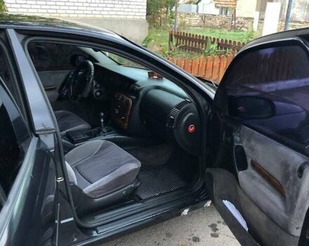 Черный Опель Омега, объемом двигателя 2.5 л и пробегом 155 тыс. км за 3000 $, фото 3 на Automoto.ua