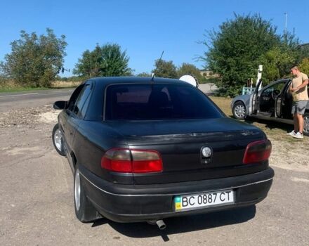 Черный Опель Омега, объемом двигателя 2 л и пробегом 287 тыс. км за 1750 $, фото 1 на Automoto.ua