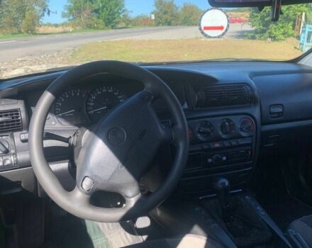 Черный Опель Омега, объемом двигателя 2 л и пробегом 287 тыс. км за 1750 $, фото 4 на Automoto.ua