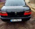 Черный Опель Омега, объемом двигателя 2.5 л и пробегом 220 тыс. км за 1800 $, фото 2 на Automoto.ua