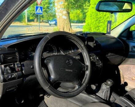 Черный Опель Омега, объемом двигателя 2 л и пробегом 516 тыс. км за 2000 $, фото 8 на Automoto.ua