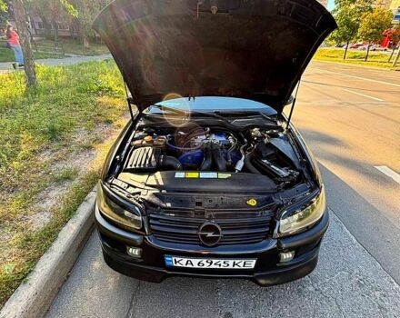 Черный Опель Омега, объемом двигателя 2.5 л и пробегом 300 тыс. км за 3000 $, фото 8 на Automoto.ua