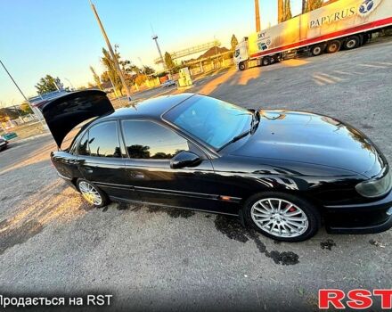 Черный Опель Омега, объемом двигателя 2.5 л и пробегом 300 тыс. км за 3000 $, фото 4 на Automoto.ua