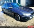 Черный Опель Омега, объемом двигателя 2.5 л и пробегом 450 тыс. км за 2000 $, фото 1 на Automoto.ua