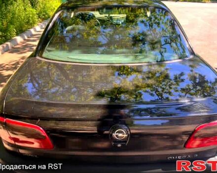 Чорний Опель Омега, об'ємом двигуна 2 л та пробігом 380 тис. км за 1700 $, фото 3 на Automoto.ua