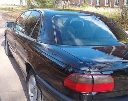 Чорний Опель Омега, об'ємом двигуна 2 л та пробігом 300 тис. км за 2600 $, фото 12 на Automoto.ua