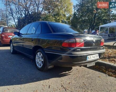 Чорний Опель Омега, об'ємом двигуна 2 л та пробігом 200 тис. км за 3300 $, фото 3 на Automoto.ua