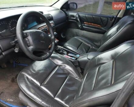 Чорний Опель Омега, об'ємом двигуна 2.5 л та пробігом 340 тис. км за 2596 $, фото 4 на Automoto.ua