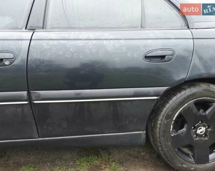 Чорний Опель Омега, об'ємом двигуна 2.5 л та пробігом 340 тис. км за 2596 $, фото 21 на Automoto.ua