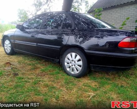 Чорний Опель Омега, об'ємом двигуна 2 л та пробігом 380 тис. км за 1700 $, фото 2 на Automoto.ua